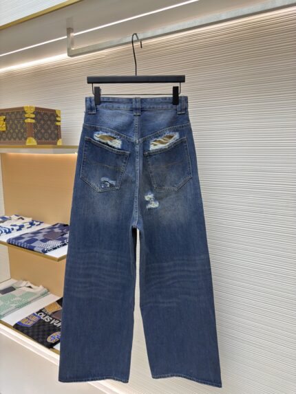 Balenciaga destroys denim wide leg pants