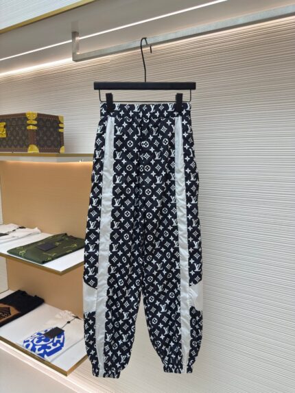 Louis Vuitton all-over print technical track pants